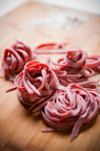 Uncooked beet infused pasta